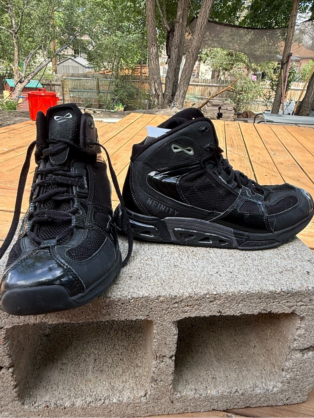 Nfinity Beast Mid-Top Cheer Shoes in the all-black colorway